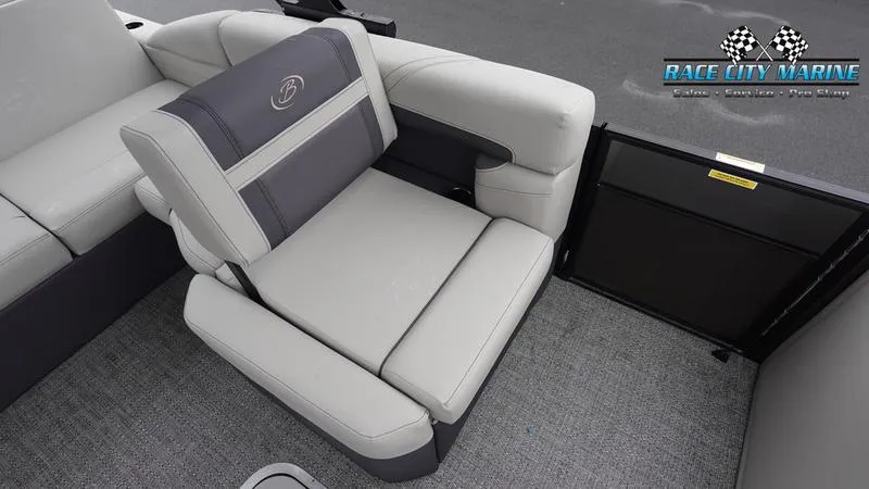 Slide: The Image of 2025 Barletta C22U boat interior with plush seating and Race City Marine logo. - 25