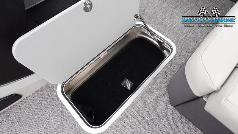 Slide: The Image of Barletta C22U 2025 storage compartment with open lid, showcasing interior space. - 28