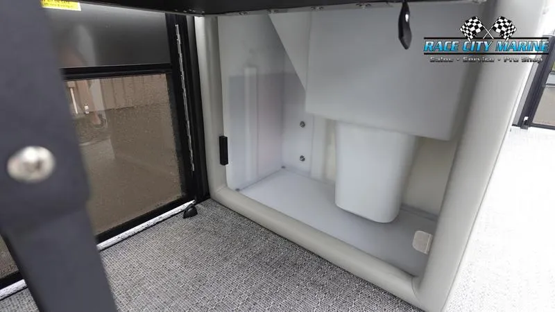 Slide: The Image of 2025 Barletta C22U interior storage compartment with Race City Marine branding. - 30