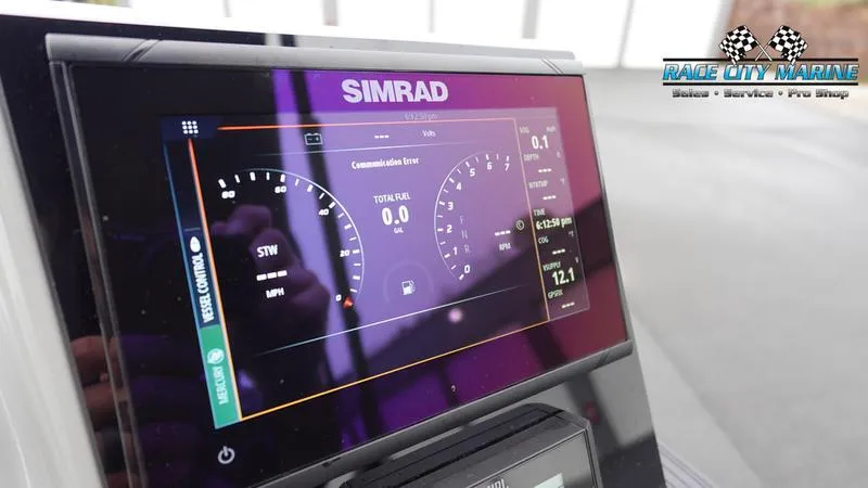 Slide: The Image of Simrad display on 2025 Barletta C22U boat dashboard, showing speed and fuel data. - 36