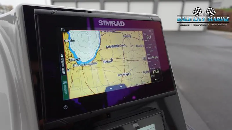 Slide: The Image of Simrad navigation display on 2025 Barletta C22U boat, showing Chicago area map. - 38