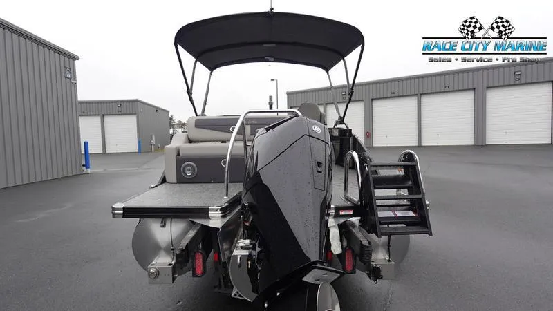 Slide: The Image of 2025 Barletta C22U pontoon boat with outboard motor at Race City Marine. - 4