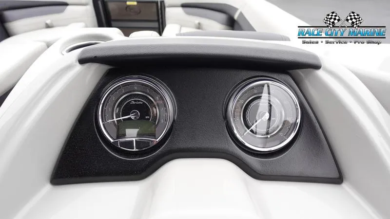 Slide: The Image of 2025 Barletta C22U dashboard with dual gauges, Race City Marine branding. - 40