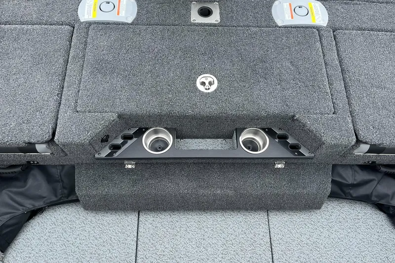 Slide: The Image of 2025 Lund 1975 Pro-V boat deck with cup holders and storage compartments. - 18