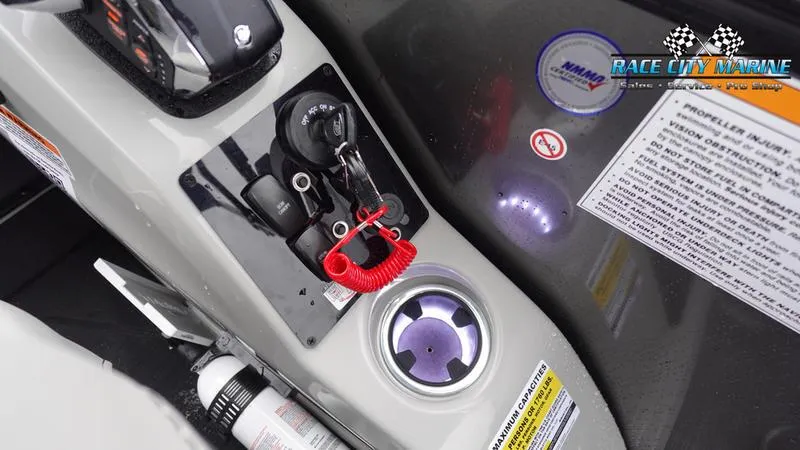 Slide: The Image of Control panel of 2025 Barletta C22UC boat with safety features and branding. - 29