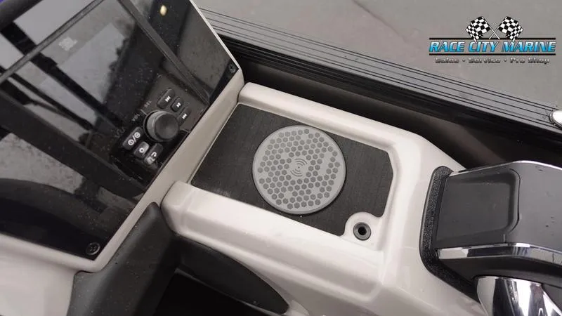 Slide: The Image of Barletta C22UC 2025 boat console with control panel and speaker. - 31