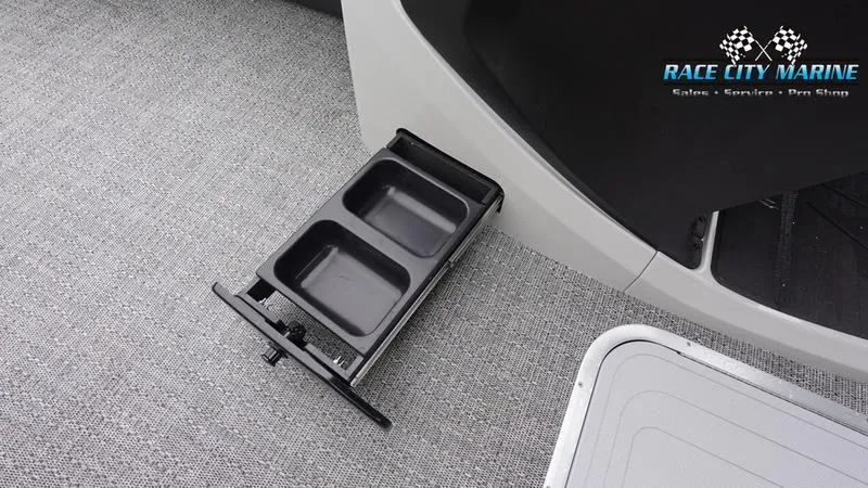 Slide: The Image of Barletta C22UC 2025 boat interior with cup holders and Race City Marine logo. - 39