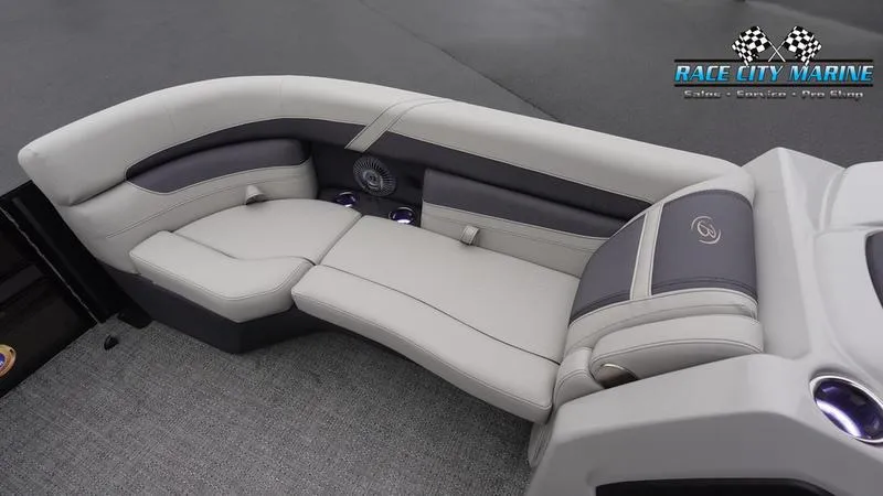 Slide: The Image of 2025 Barletta C22UC boat interior with plush seating and modern design. - 40