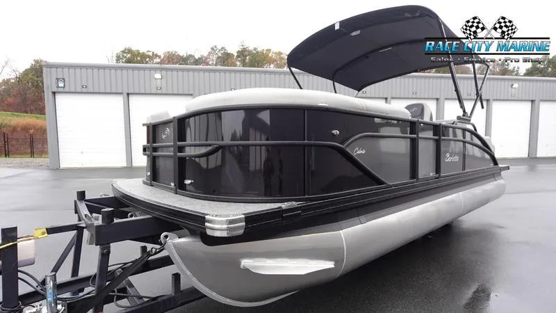 Slide: The Image of 2025 Barletta C22UC pontoon boat on trailer at Race City Marine. - 6