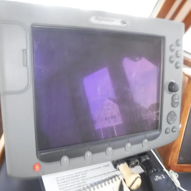 Slide: The Image of Raymarine navigation display on 1998 Legacy 40' Flybridge yacht. - 13