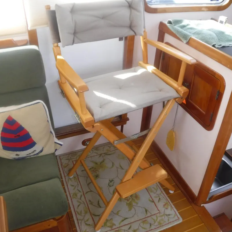 Slide: The Image of Wooden director's chair in 1998 Legacy 40' Flybridge interior. - 20