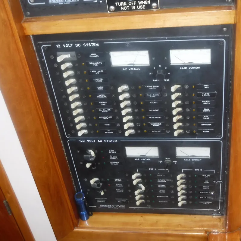 Slide: The Image of Electrical control panel on a 1998 Legacy 40' Flybridge boat. - 24