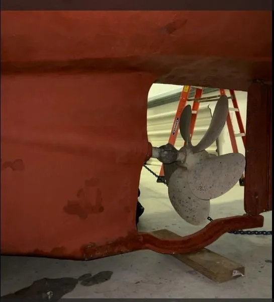 Slide: The Image of Propeller of 1998 Legacy 40' Flybridge boat in dry dock. - 33