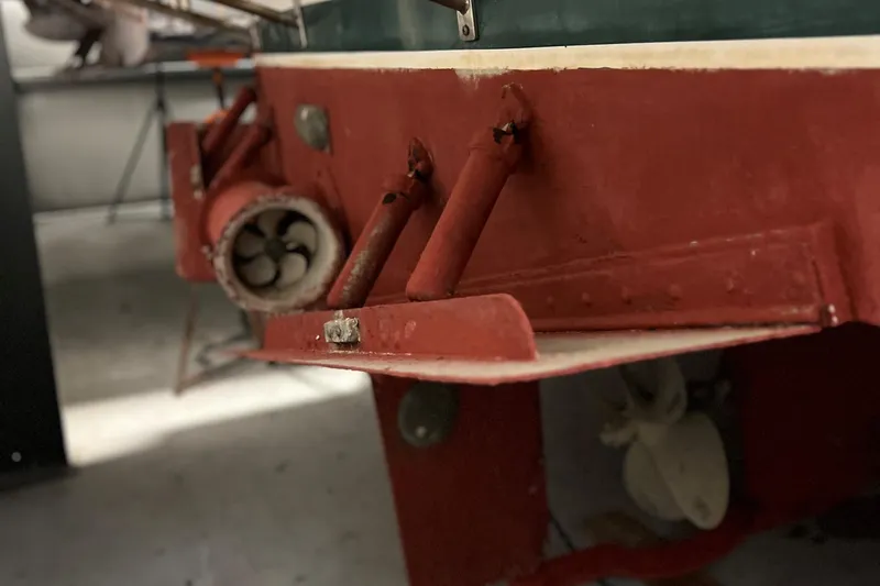 Slide: The Image of Close-up of 1998 Legacy 40' Flybridge boat's stern with propeller and rudder. - 34