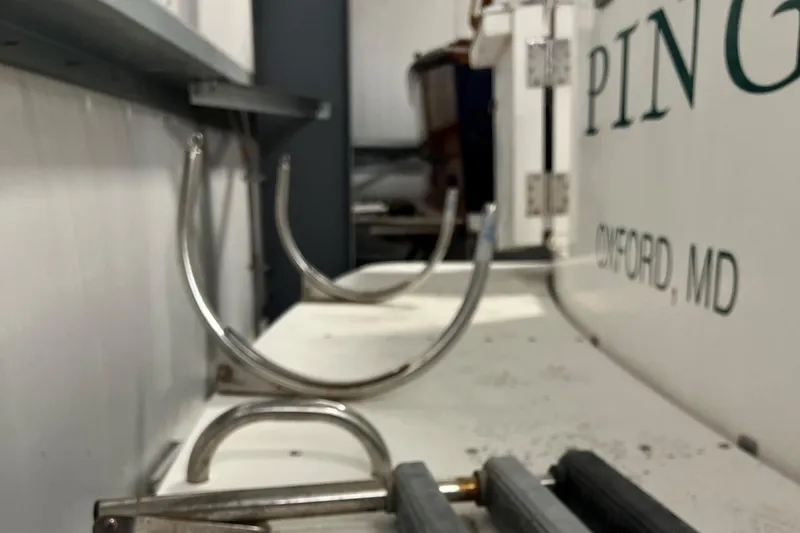 Slide: The Image of Legacy 40' Flybridge 1998 boat interior with metal fixtures, Oxford, MD. - 35