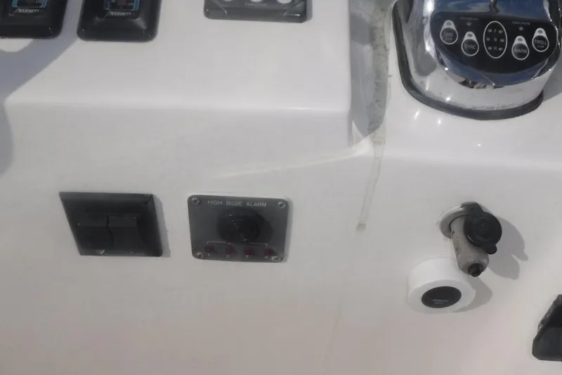 Slide: The Image of Control panel of a 1998 Legacy 40' Flybridge boat. - 45