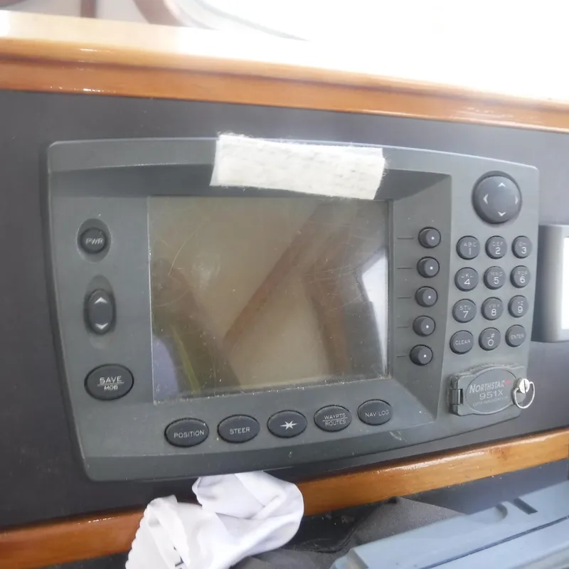 Slide: The Image of Navigation system on 1998 Legacy 40' Flybridge yacht dashboard. - 9