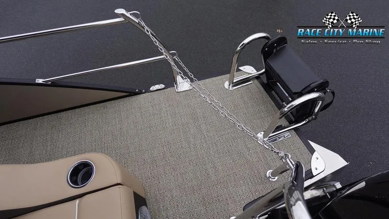 Slide: The Image of 2025 Barletta C22UC boat deck with seating and safety chain, Race City Marine logo. - 10