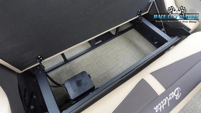 Slide: The Image of 2025 Barletta C22UC storage compartment with Race City Marine logo. - 17