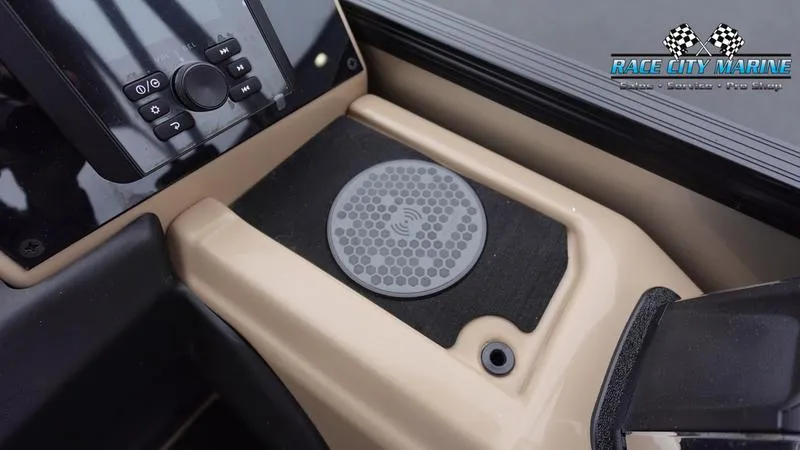 Slide: The Image of Barletta C22UC 2025 boat dashboard with control panel and wireless charging pad. - 29