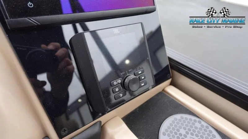 Slide: The Image of 2025 Barletta C22UC boat control panel with Race City Marine branding. - 30
