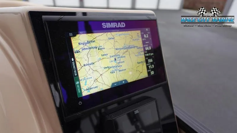 Slide: The Image of Simrad navigation display on 2025 Barletta C22UC boat dashboard. - 31