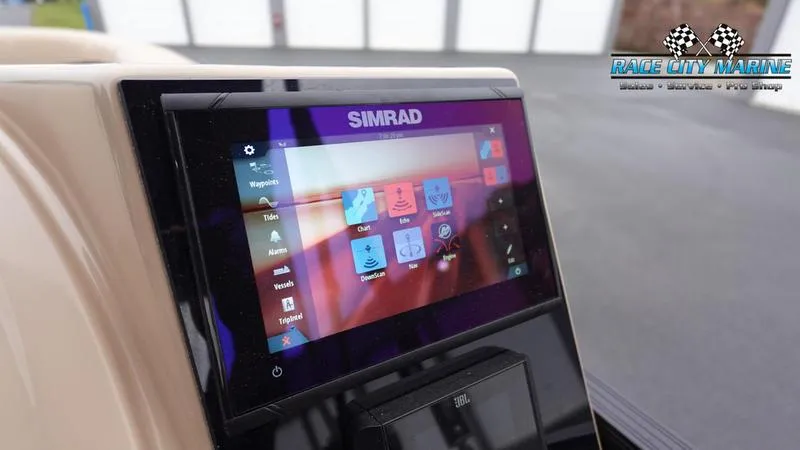 Slide: The Image of Simrad display on 2025 Barletta C22UC boat dashboard at Race City Marine. - 32
