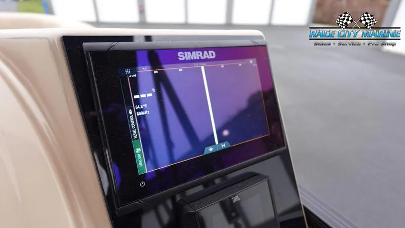 Slide: The Image of Simrad display on 2025 Barletta C22UC boat dashboard at Race City Marine. - 33