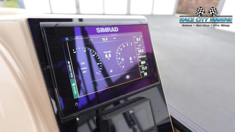 Slide: The Image of Simrad display on 2025 Barletta C22UC boat dashboard at Race City Marine. - 34