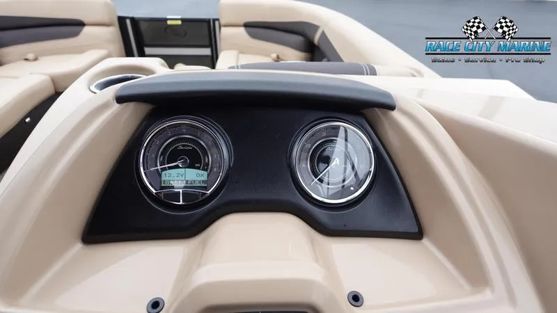 Slide: The Image of Dashboard of 2025 Barletta C22UC boat with gauges, Race City Marine logo. - 36