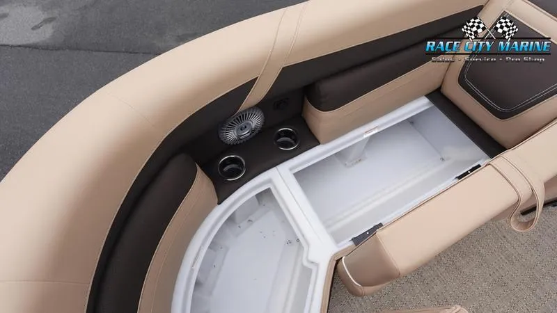 Slide: The Image of 2025 Barletta C22UC boat interior with storage and cup holders. - 45