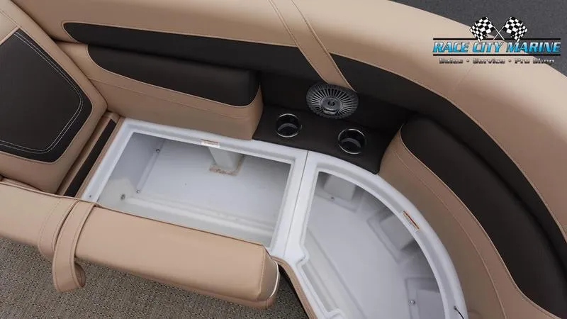 Slide: The Image of 2025 Barletta C22UC boat seating with storage compartments and cup holders. - 46