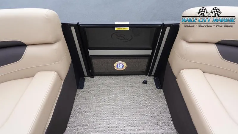 Slide: The Image of Barletta C22UC 2025 boat interior with beige seating and Race City Marine logo. - 47