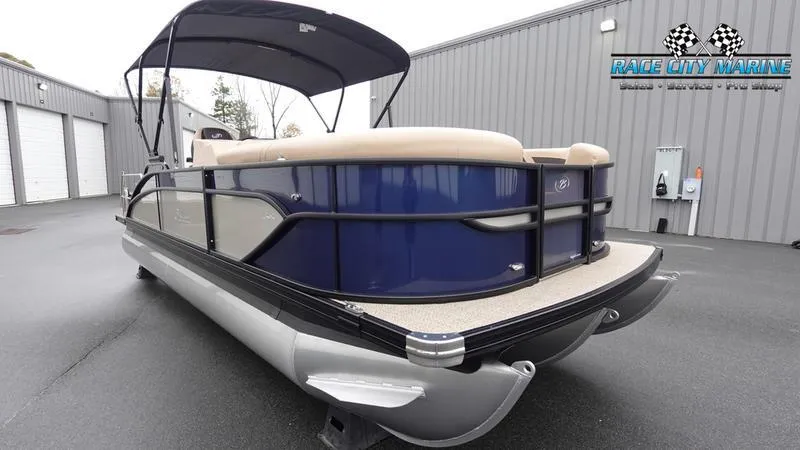 Slide: The Image of 2025 Barletta C22UC pontoon boat with blue exterior at Race City Marine. - 5