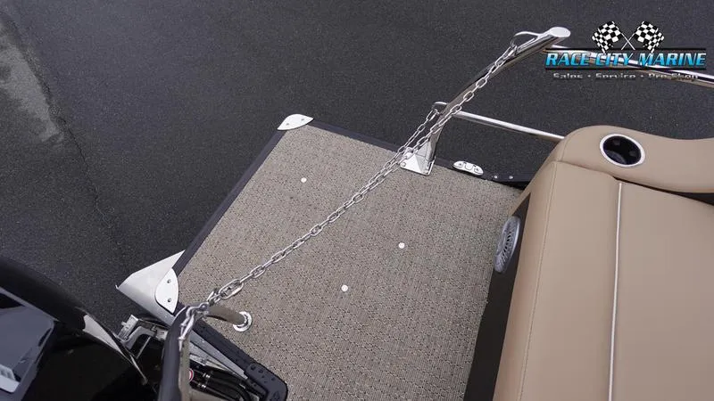 Slide: The Image of Barletta C22UC 2025 boat deck with chain and seating, Race City Marine logo. - 9