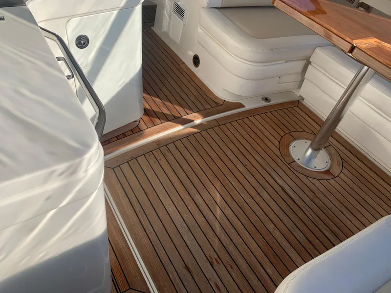 Slide: The Image of Luxurious teak deck and seating area on 2014 Sea Ray 410 Sundancer yacht. - 12