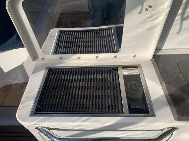 Slide: The Image of Built-in grill on 2014 Sea Ray 410 Sundancer yacht deck. - 17