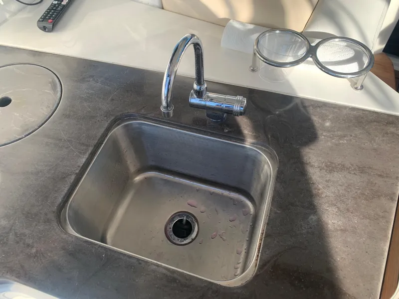 Slide: The Image of Stainless steel sink on 2014 Sea Ray 410 Sundancer yacht kitchen counter. - 18