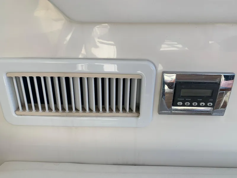 Slide: The Image of Air vent and control panel on 2014 Sea Ray 410 Sundancer yacht. - 19