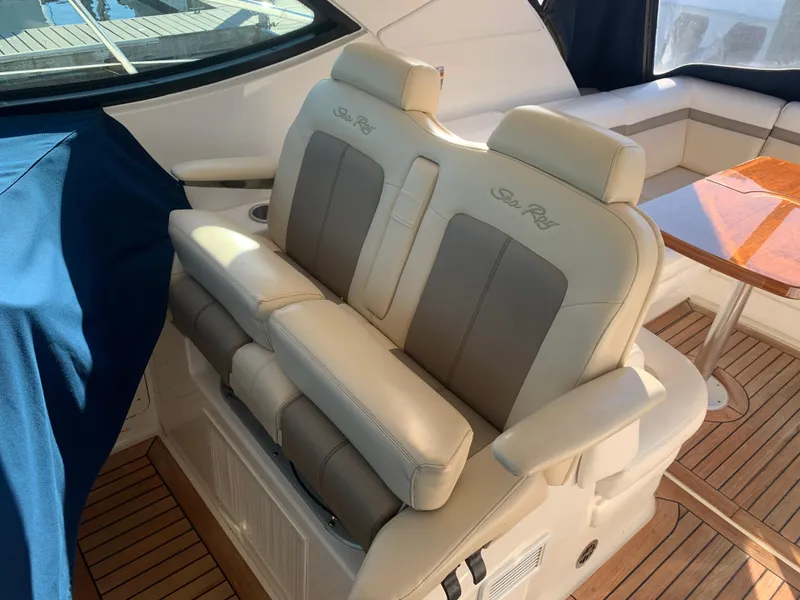 Slide: The Image of Luxurious seating on 2014 Sea Ray 410 Sundancer yacht with elegant interior design. - 22