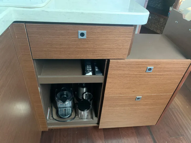 Slide: The Image of Wooden cabinet with coffee maker in 2014 Sea Ray 410 Sundancer yacht kitchen. - 45