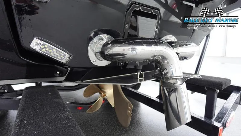 Slide: The Image of 2025 Nautique Super Air Nautique G23 Paragon boat exhaust and propeller detail. - 10