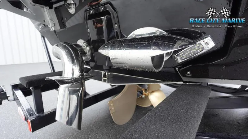Slide: The Image of 2025 Nautique Super Air Nautique G23 Paragon boat propeller and exhaust system close-up. - 11