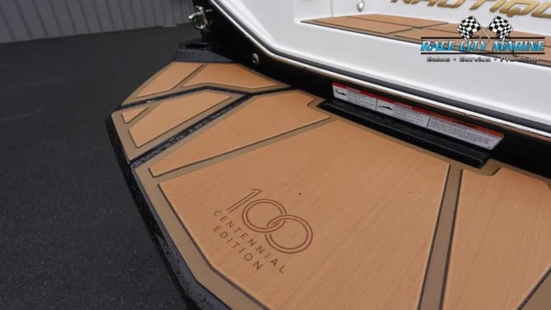 Slide: The Image of 2025 Nautique Super Air Nautique G23 Paragon Centennial Edition boat deck detail. - 13