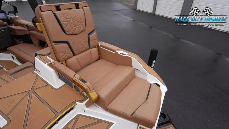 Slide: The Image of Luxurious seating on 2025 Nautique Super Air Nautique G23 Paragon boat. - 18