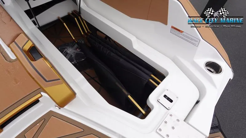 Slide: The Image of Storage compartment of 2025 Nautique Super Air Nautique G23 Paragon boat. - 20