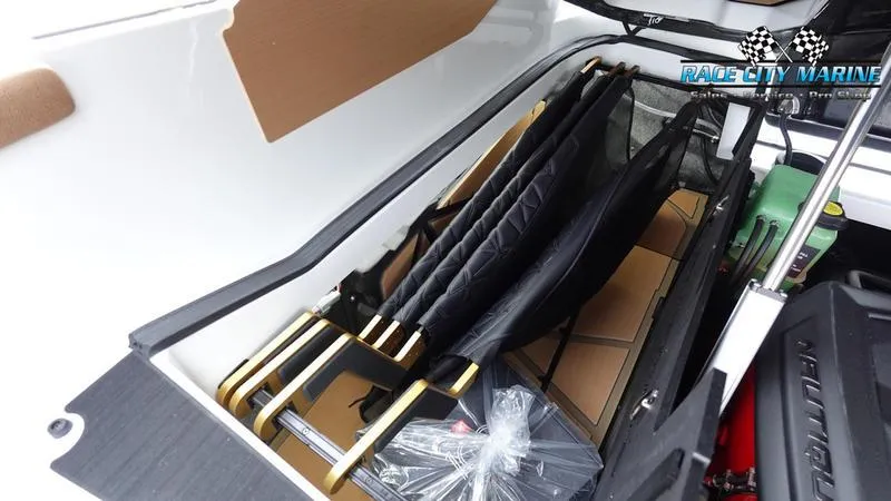 Slide: The Image of Storage compartment of 2025 Nautique Super Air Nautique G23 Paragon boat. - 28