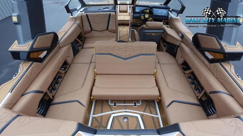 Slide: The Image of Luxurious interior of 2025 Nautique Super Air Nautique G23 Paragon boat. - 30