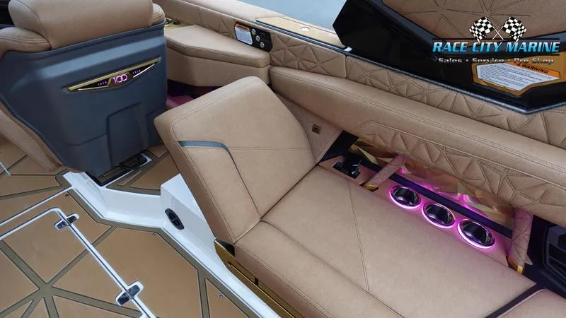 Slide: The Image of Luxurious interior of 2025 Nautique Super Air Nautique G23 Paragon with ambient lighting. - 35