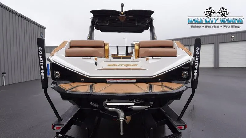 Slide: The Image of 2025 Nautique Super Air Nautique G23 Paragon boat rear view at Race City Marine. - 4
